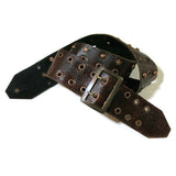 A burgundy copper textured leather guitar strap with antique-copper toned metal studs, star-shaped accents, and a dark metal buckle.