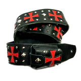 custom wireless transmitter pocket in black leather with a red cross and silver studs, snapped onto a matching guitar strap with red crosses and silver pyramid studs