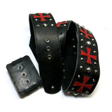 custom wireless transmitter pocket atttachment system displayed with a matching guitar strap with red crosses and silver pyramid studs