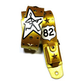 custom wireless transmitter pocket system displayed with a matching gold leather custom guitar strap 