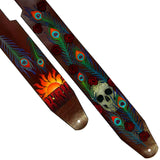 Custom leather guitar strap with airbrushed peacock feathers and crackled paint skull designs created for musician Kirk Farmer.