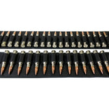 Row of silver bullets on a black leather bandolier guitar strap